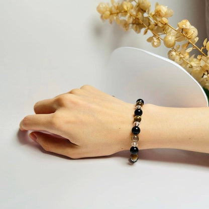 Eclipse Harmony – Clear Quartz · Obsidian · Golden Rutilated Quartz