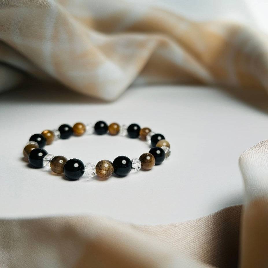 Eclipse Harmony – Clear Quartz · Obsidian · Golden Rutilated Quartz