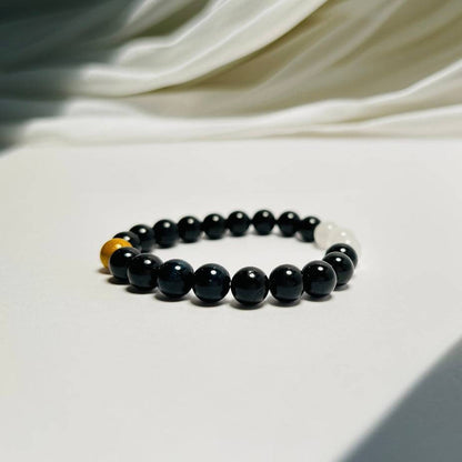 Celestial Balance – Obsidian · Moonstone · Lacquer Bead